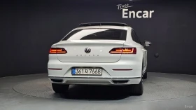 VW Arteon 2.0TDI* PREMIUM* DISTRONIC* ПОДГРЕВ* ОБДУХВАНЕ* , снимка 4