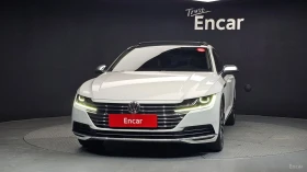 VW Arteon 2.0TDI* PREMIUM* DISTRONIC* ПОДГРЕВ* ОБДУХВАНЕ* , снимка 2
