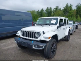 Jeep Wrangler 4XE SAHARA 4XE | Mobile.bg    2