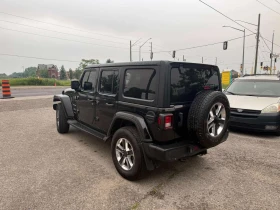 Jeep Wrangler UNLIMITED SAHARA| ПОДГРЕВИ| KEYLESS| NAVI| , снимка 11