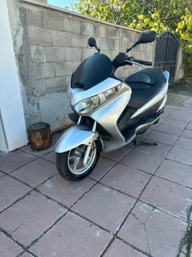     Suzuki Burgman 200 /  