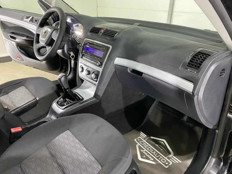 Skoda Octavia 1.6 TDI 4x4, снимка 9 - Автомобили и джипове - 50218222