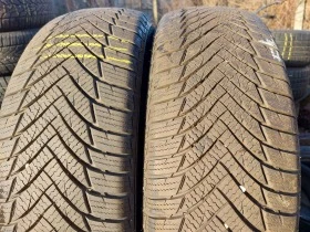 Гуми Зимни 215/65R16, снимка 1 - Гуми и джанти - 39388990