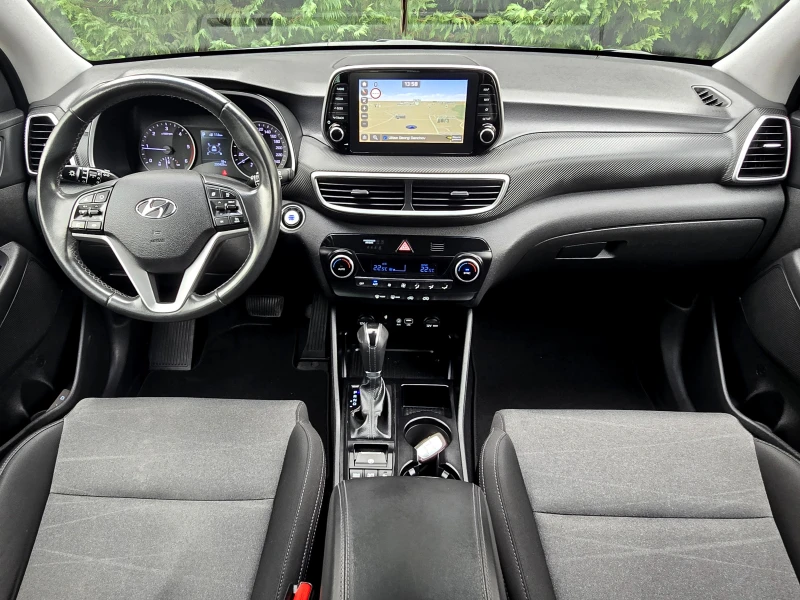 Hyundai Tucson 1.6 D PREMIUN-NAVI-KAMERA, снимка 12 - Автомобили и джипове - 52088303