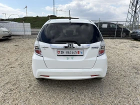 Honda Jazz 1.3 HYBRID - 6599 € / 12906.52 лв. - 79940516 7