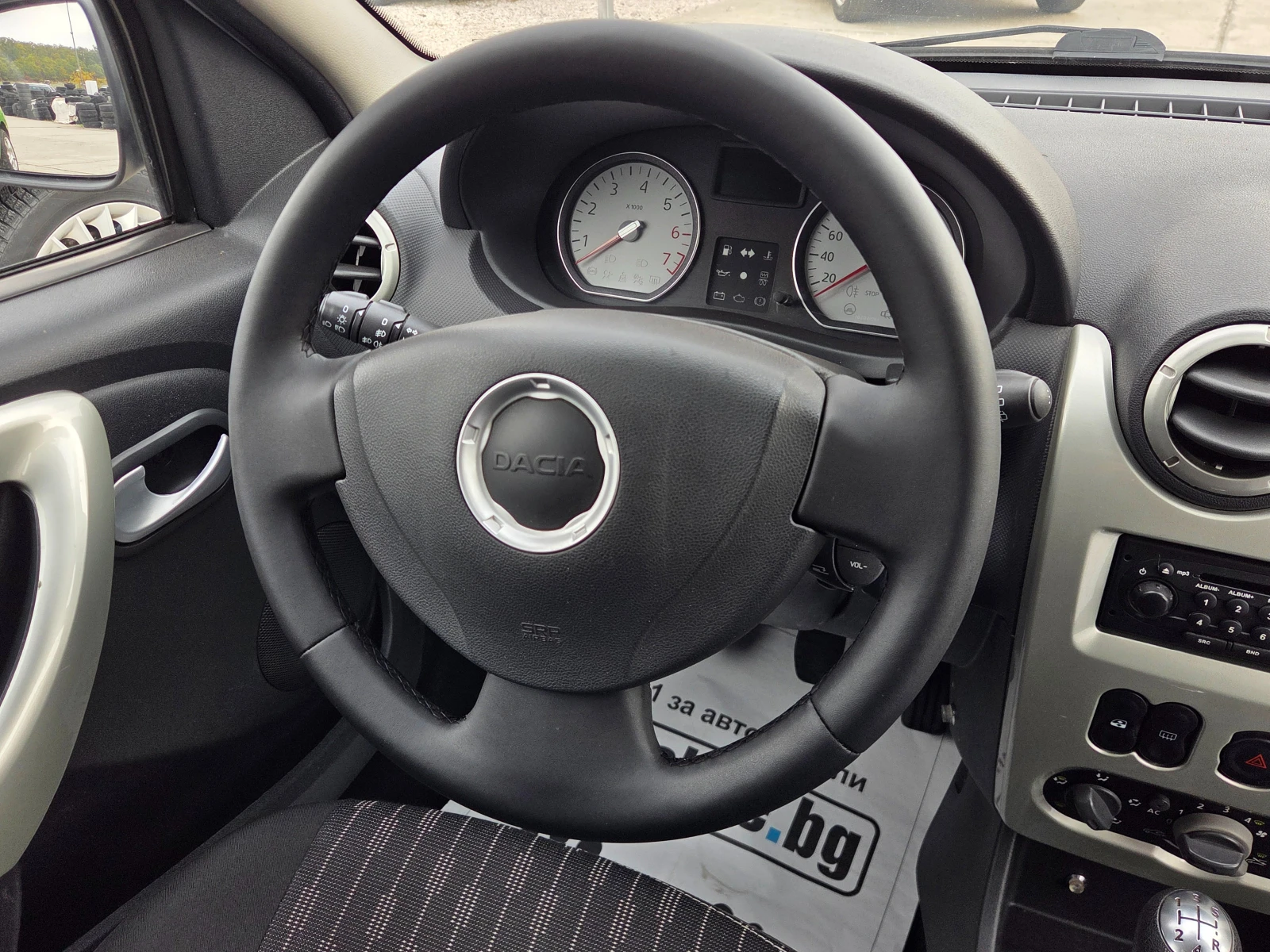 Dacia Logan 1.6, снимка 15 - Автомобили и джипове - 56650776