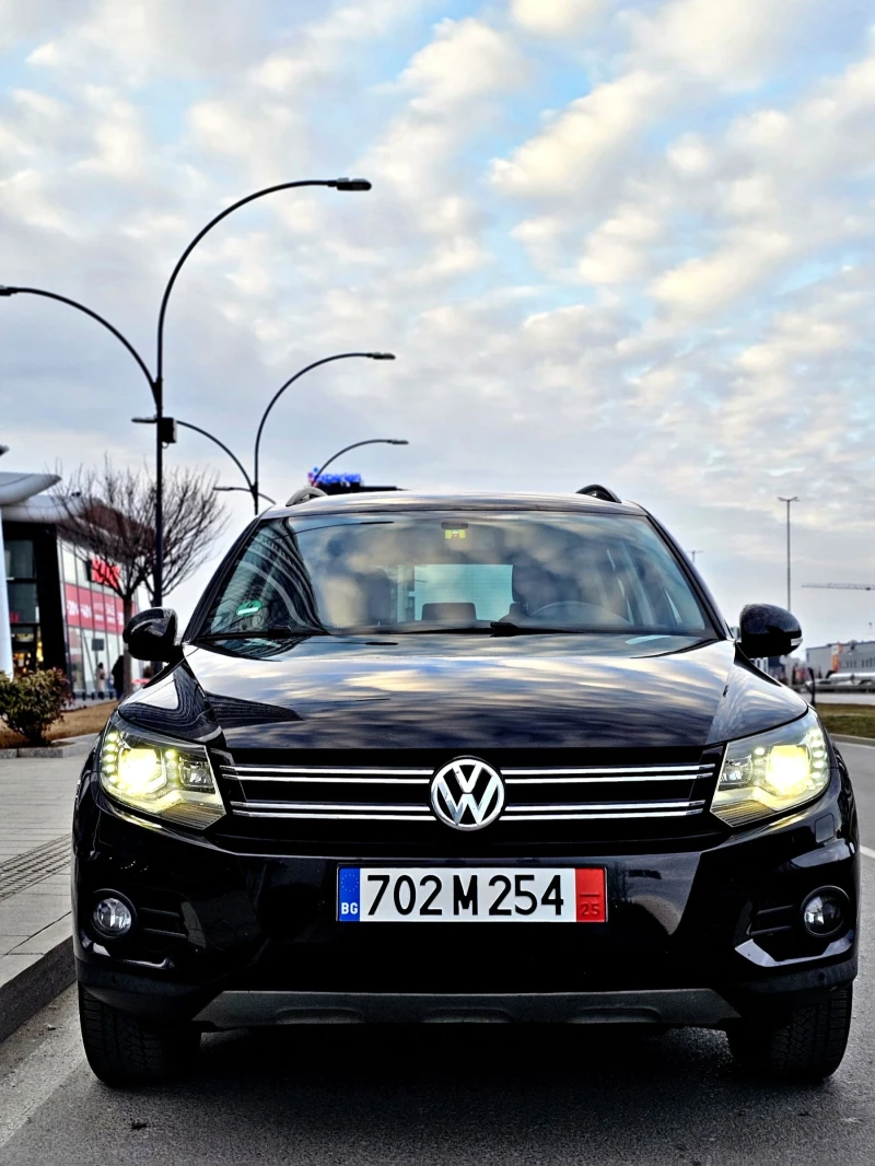 VW Tiguan 2.0tdi /4x4/Off Road пакет / Bi Xenon / Перфектна , снимка 2 - Автомобили и джипове - 49202878