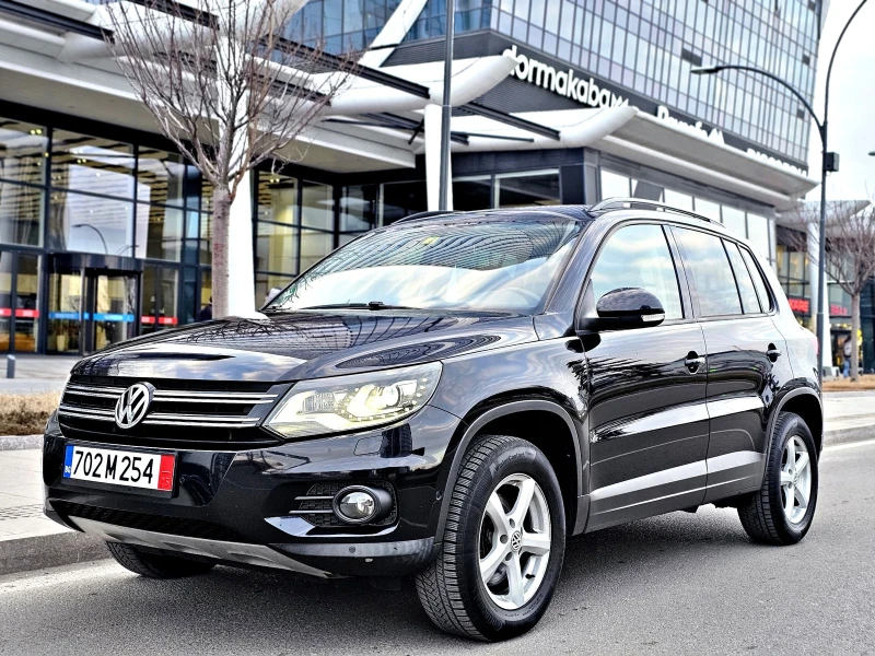 VW Tiguan 2.0tdi /4x4/Off Road пакет / Bi Xenon / Перфектна , снимка 1 - Автомобили и джипове - 49202878