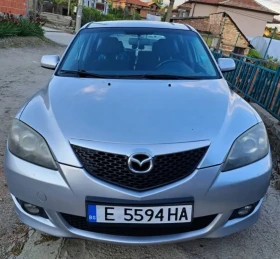 ������ Mazda 3