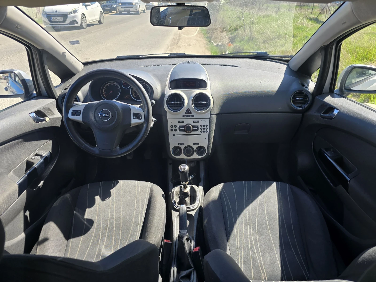 Opel Corsa 1.2i, снимка 13 - Автомобили и джипове - 54114221