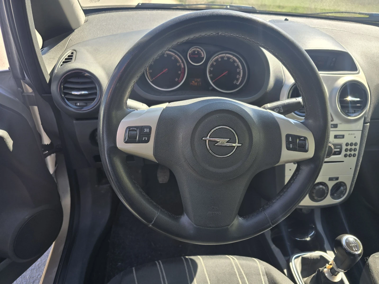 Opel Corsa 1.2i, снимка 9 - Автомобили и джипове - 54114221