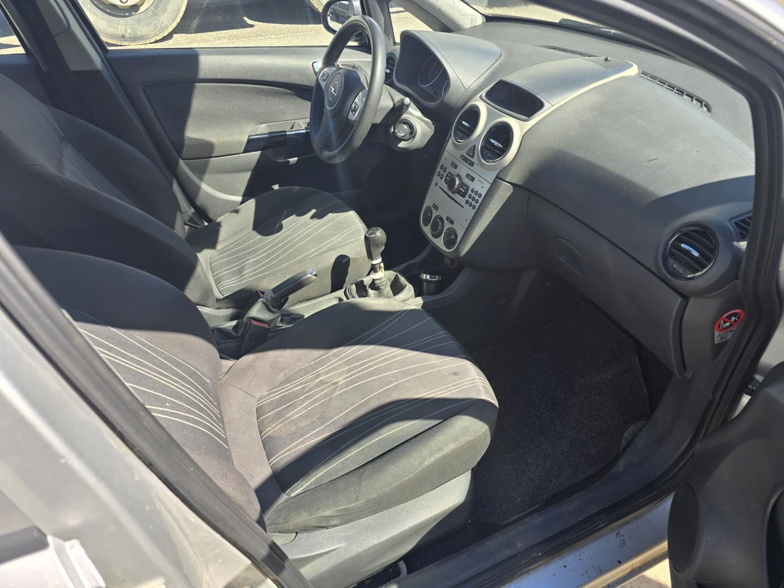 Opel Corsa 1.2i, снимка 12 - Автомобили и джипове - 54114221