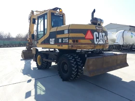  Caterpillar M315+ 3  | Mobile.bg    6