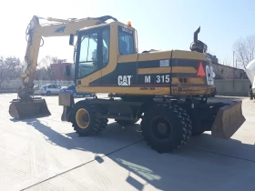  Caterpillar M315+ 3  | Mobile.bg    5