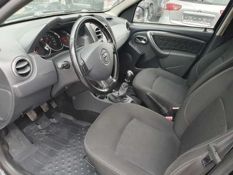 Dacia Duster 1.6i 105k.c 4x4, снимка 11 - Автомобили и джипове - 46969854