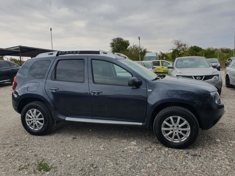 Dacia Duster 1.6i 105k.c 4x4, снимка 8 - Автомобили и джипове - 46969854