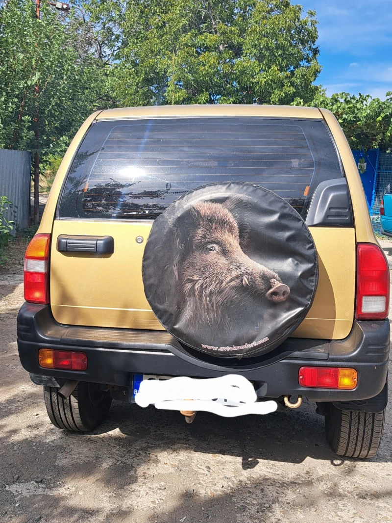 Suzuki Grand vitara, снимка 8 - Автомобили и джипове - 52030884