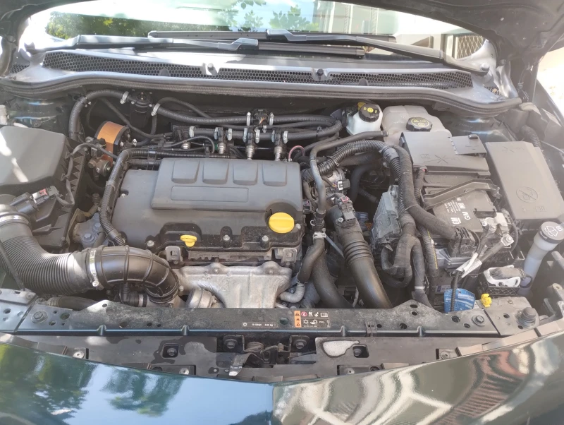 Opel Astra, снимка 12 - Автомобили и джипове - 52185616