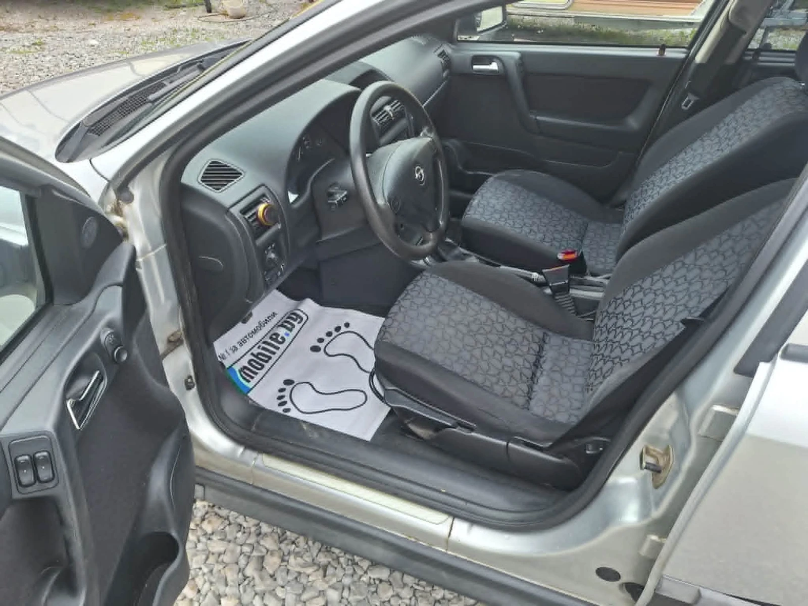 Opel Astra 1.6i klima, снимка 13 - Автомобили и джипове - 54458360