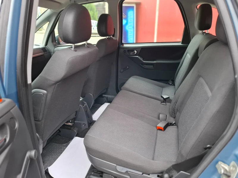 Opel Meriva 1.4i 90hp * КЛИМАТИК * EURO 4 * NAVI * , снимка 14 - Автомобили и джипове - 52479424