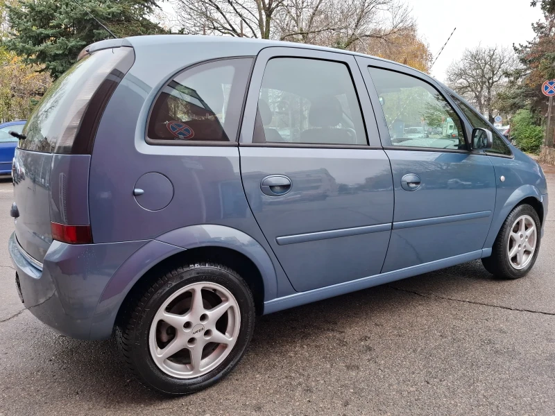 Opel Meriva 1.4i 90hp * КЛИМАТИК * EURO 4 * NAVI * , снимка 6 - Автомобили и джипове - 52479424