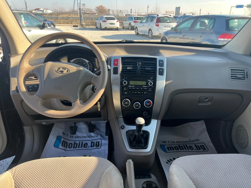 Hyundai Tucson 2.0i bifuel, снимка 9 - Автомобили и джипове - 48352135