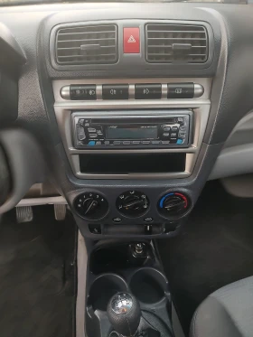 Kia Picanto 1.1 70 коня, снимка 13