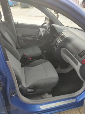 Kia Picanto 1.1 70 коня, снимка 14