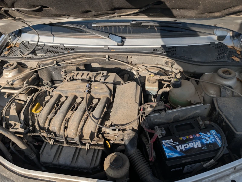 Dacia Logan 1.6i 7 места, снимка 14 - Автомобили и джипове - 52800134