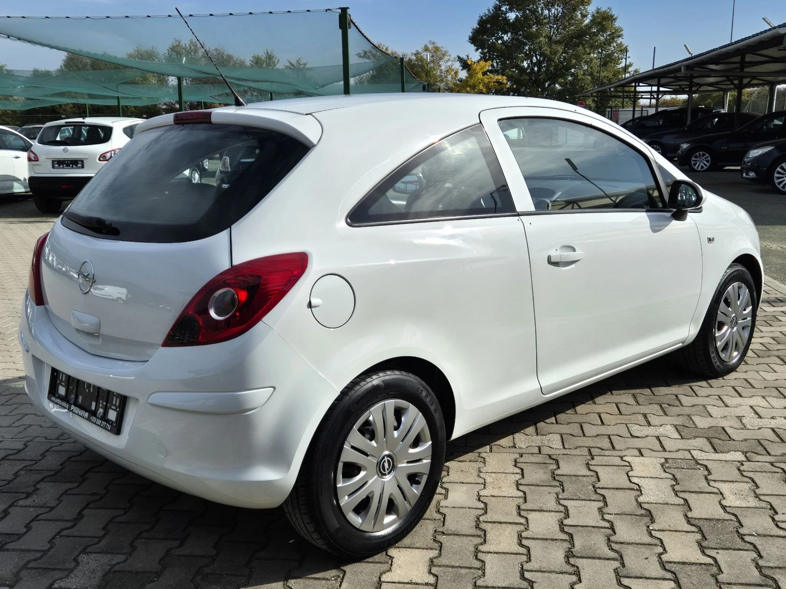 Opel Corsa 1.2 газ/бензин 80к.с. - изображение 7