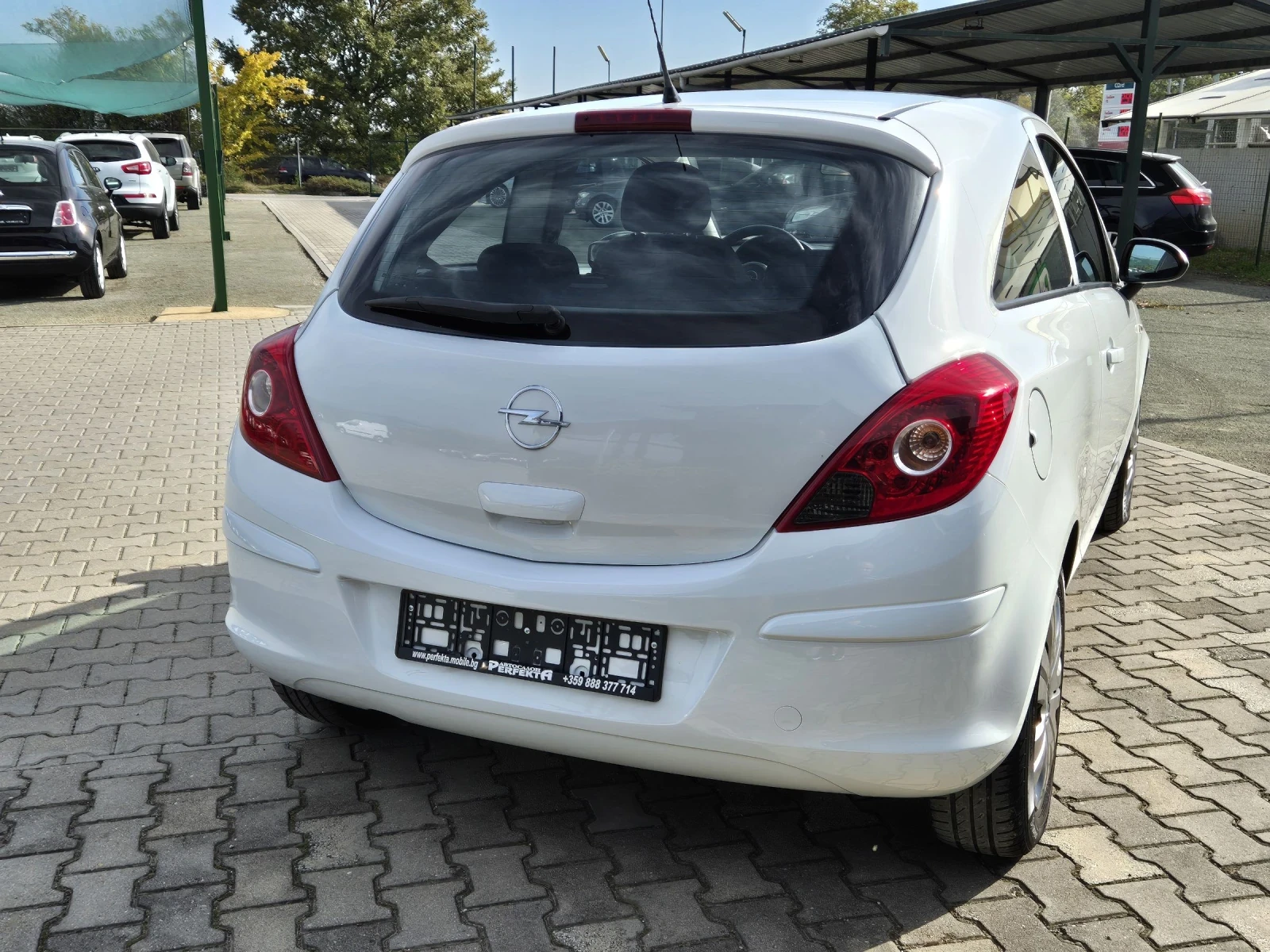 Opel Corsa 1.2 газ/бензин 80к.с. - изображение 8