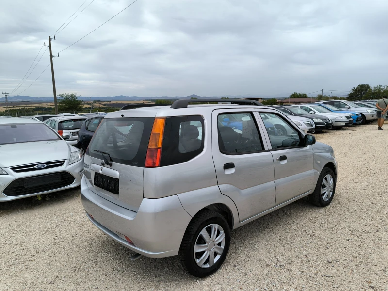 Subaru Justy 1.3I 4X4, снимка 5 - Автомобили и джипове - 47193729