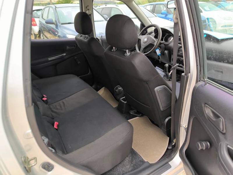 Subaru Justy 1.3I 4X4, снимка 9 - Автомобили и джипове - 47193729