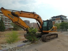 Багер JCB JS210LC - изображение 1