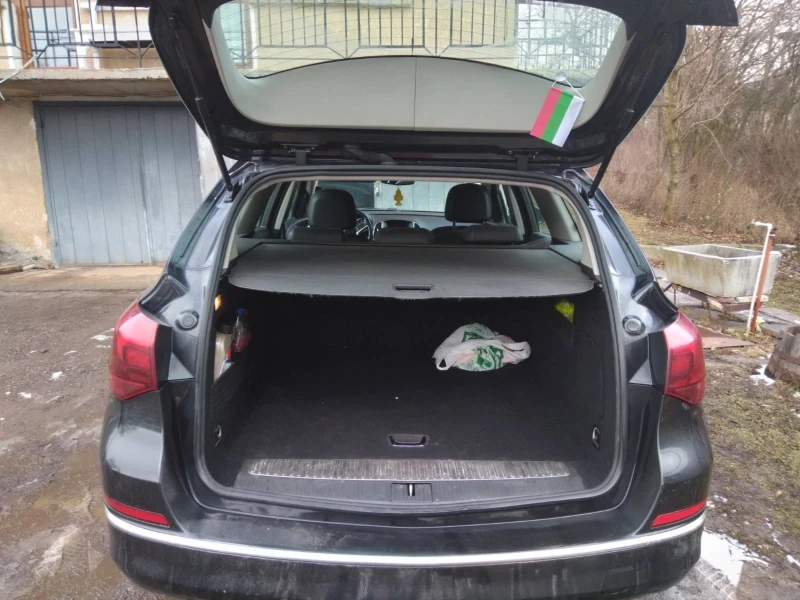 Opel Astra 1.7 CDTI 110 к.с. Facelift , снимка 12 - Автомобили и джипове - 53185714