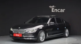 BMW 740 АВТОКРЕДИТ* LONG* ТЕЛЕВИЗОРИ* ДИСТРОНИК* 360* МАСА, снимка 1
