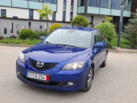 ������ Mazda 3