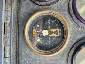 Багер Cat 438B 4x4, снимка 6