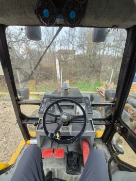 Багер Cat 438B 4x4 | Auto.bg — изображение 5