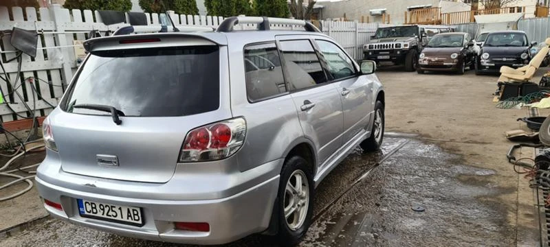 Mitsubishi Outlander 2.4 Газ - изображение 3