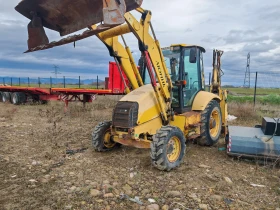 Багер Komatsu  - изображение 1