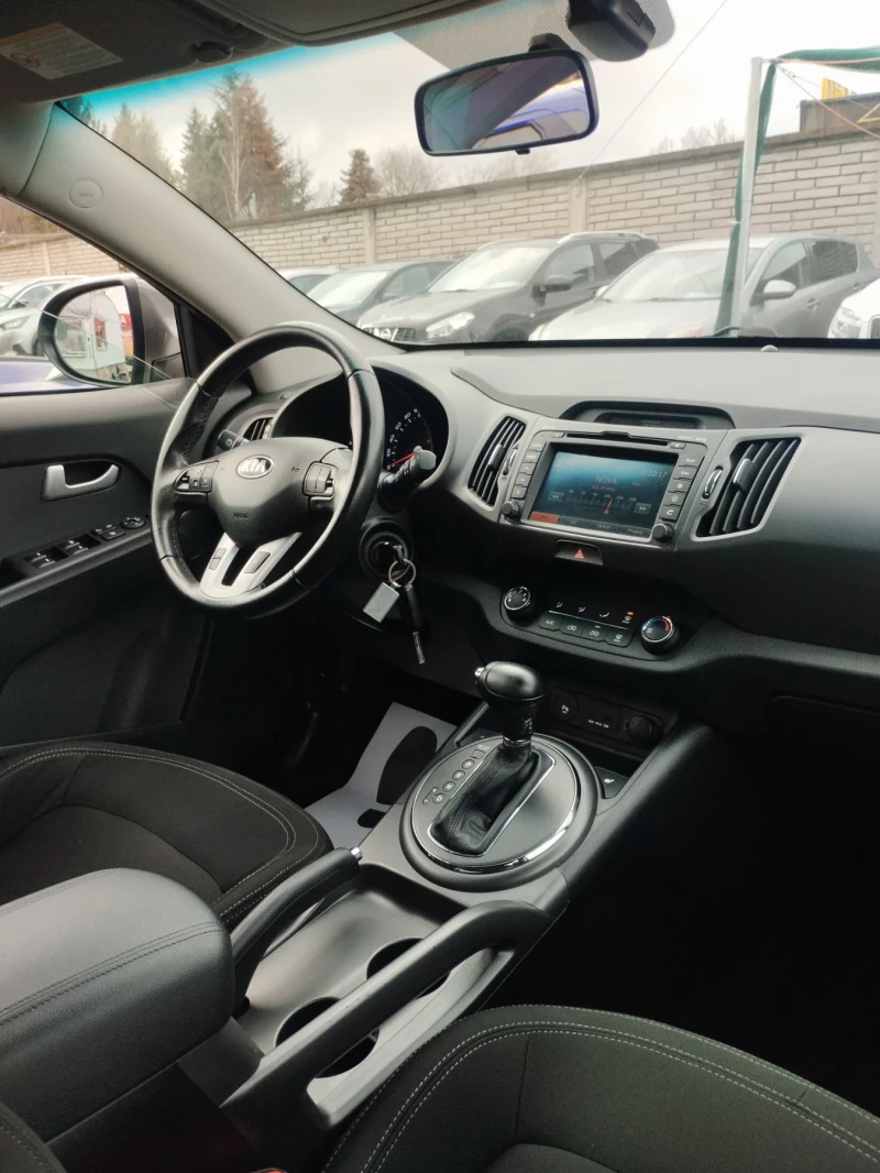 Kia Sportage 2.0 benzin navigation automatic 4* 4, снимка 9 - Автомобили и джипове - 53292517