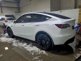 Tesla Model Y LONG RANGE AWD - 20800 € / 40681.26 лв. - 93269293 4