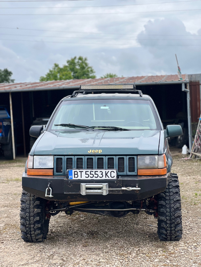 Jeep Grand cherokee 5.2 mPI, снимка 1 - Автомобили и джипове - 46449135
