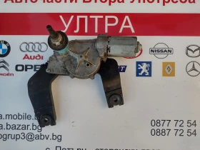 98700-2L000 Моторче задна чистачка Hyundai i30 (2007-2012) мотор 987002L000 , снимка 2 - Части - 52752440