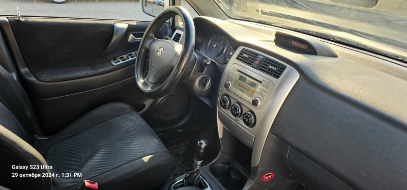 Suzuki Liana, снимка 10 - Автомобили и джипове - 47792019