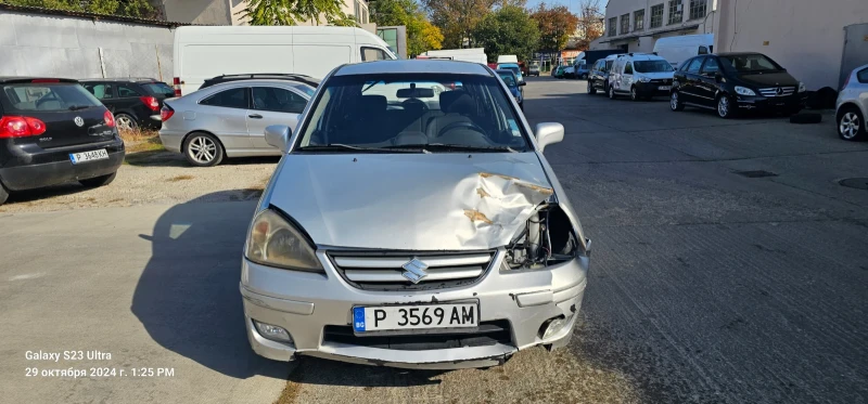 Suzuki Liana, снимка 7 - Автомобили и джипове - 47792019