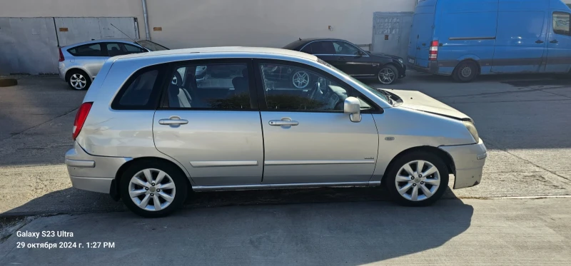 Suzuki Liana, снимка 1 - Автомобили и джипове - 47792019