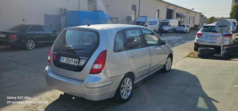 Suzuki Liana, снимка 2 - Автомобили и джипове - 47792019