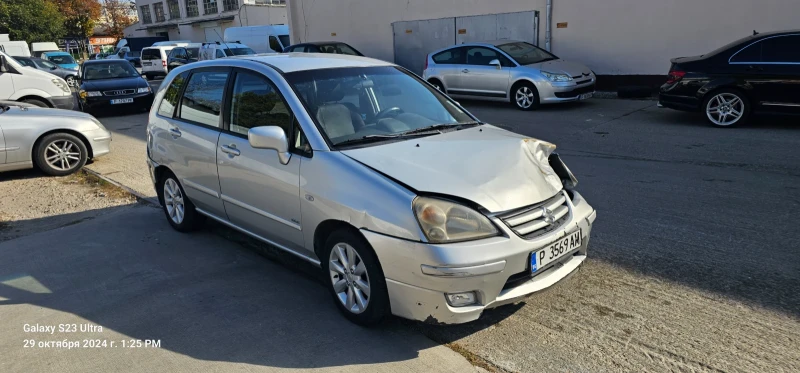 Suzuki Liana, снимка 8 - Автомобили и джипове - 47792019